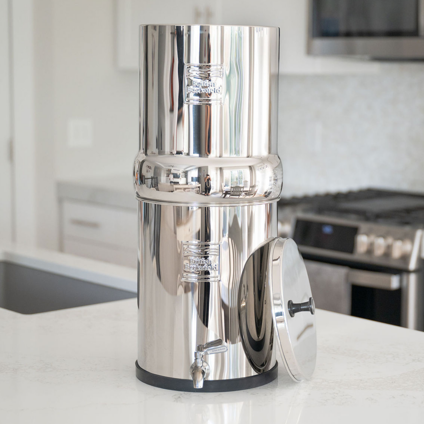 british berkefeld gravity water filter with lid off on counter