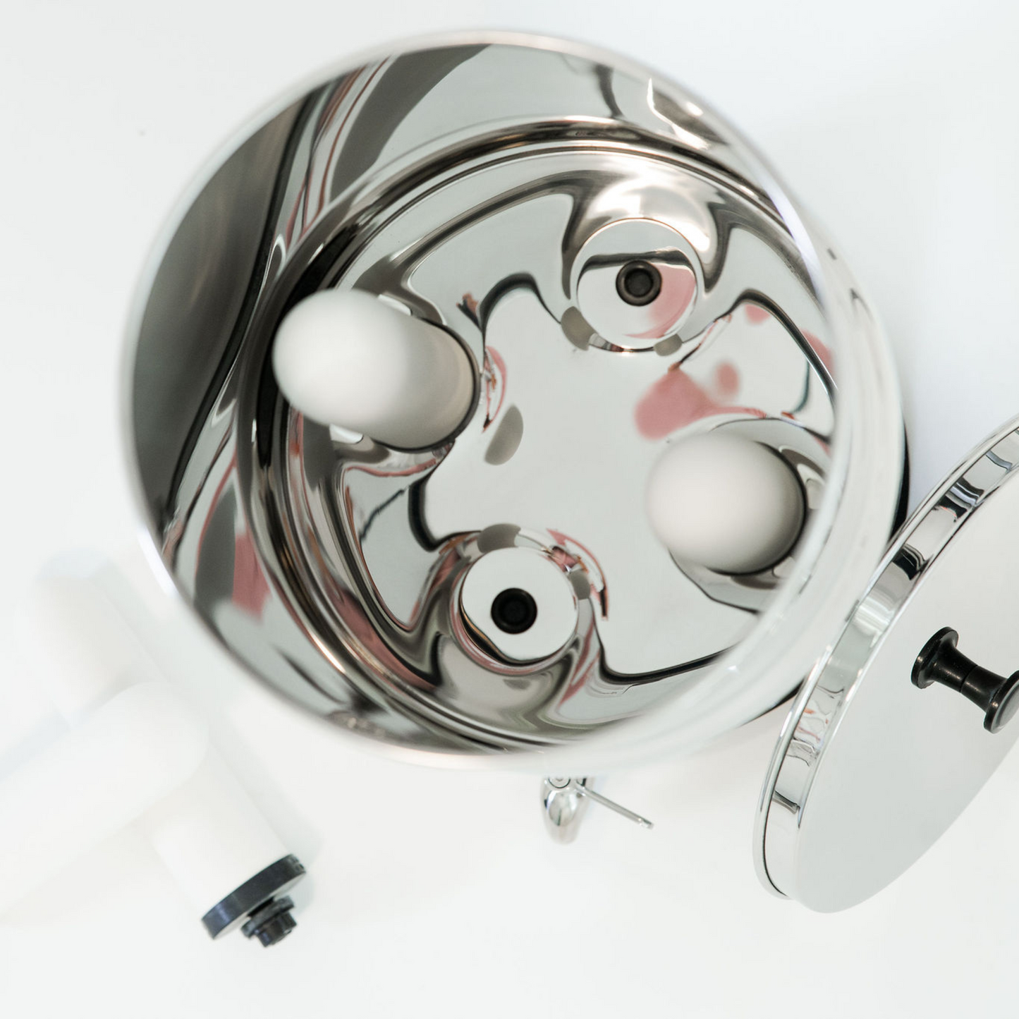 Top down angle of the british berkefeld water filter with the lid off view looking in at filter elements installed